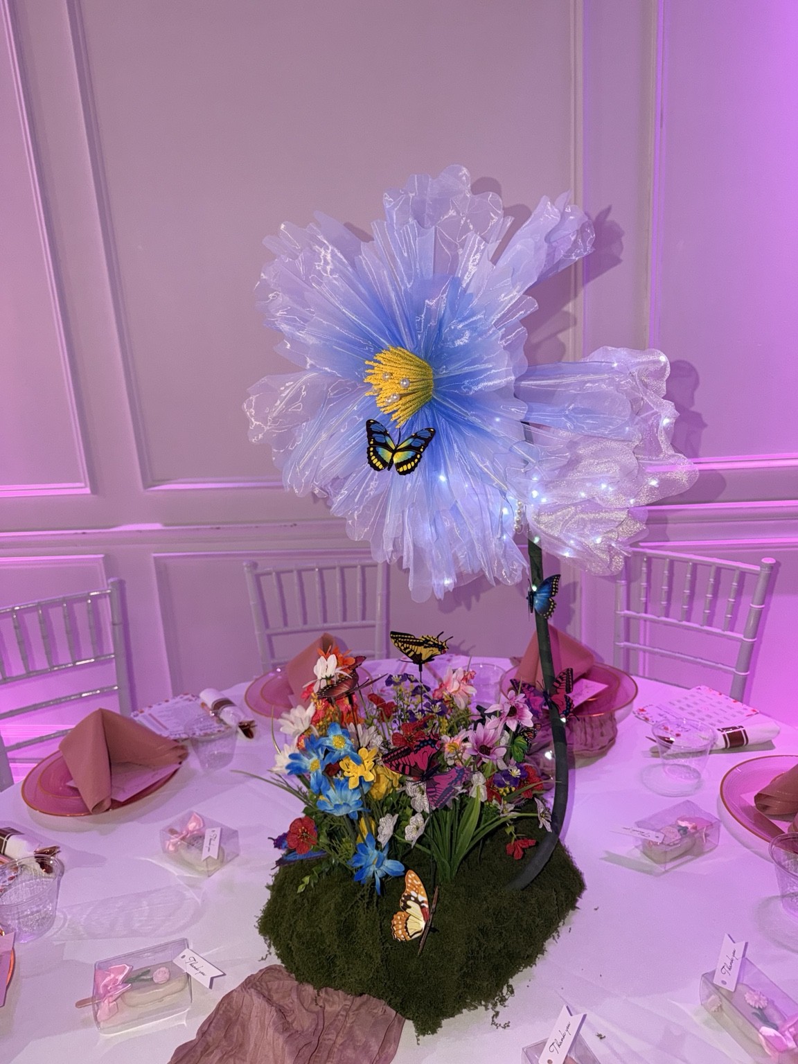 Oversized illuminated flower centerpiece with butterflies